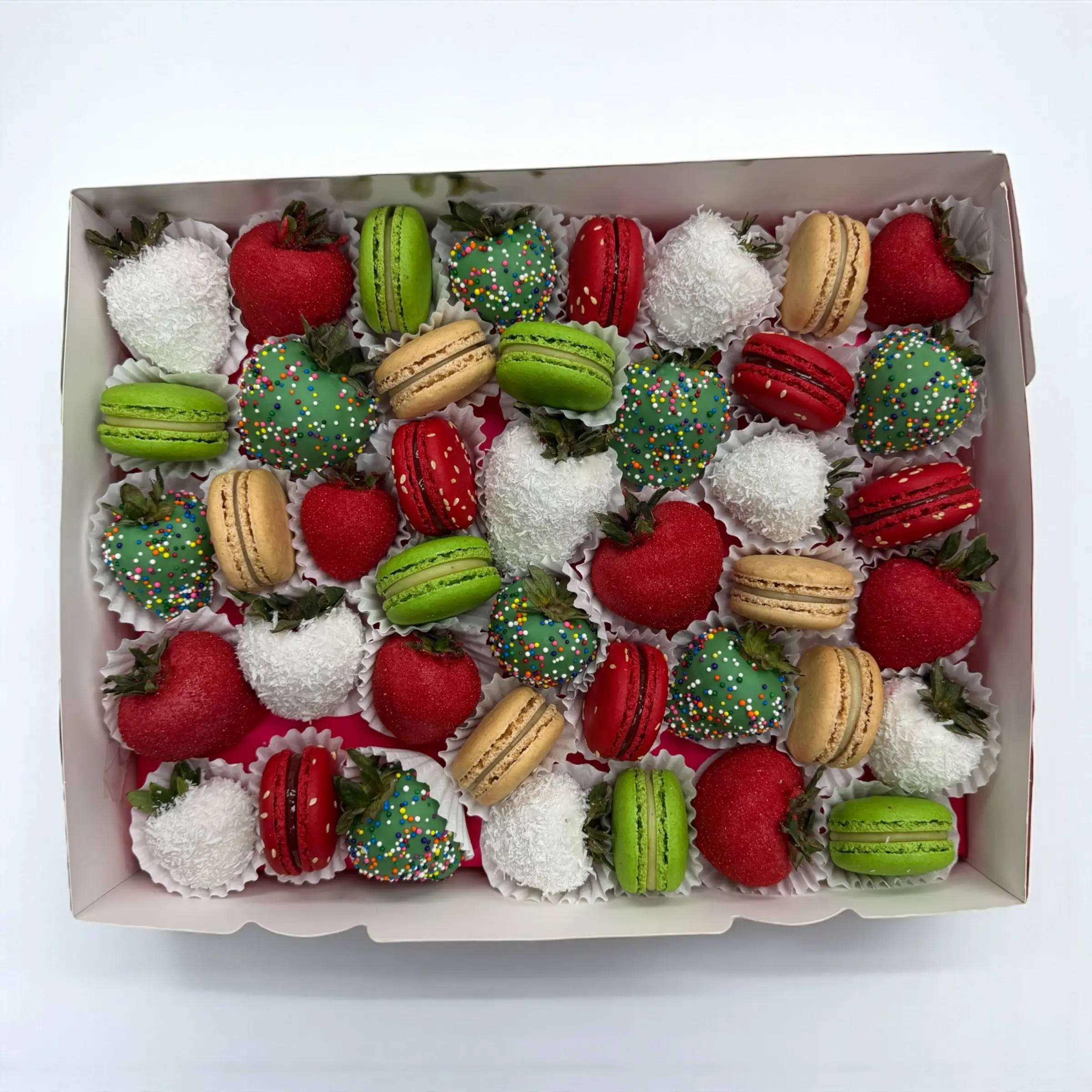 WOWBouquet Christmas gift boxes with Santa design arranged for holiday display WOWBouquet mini Christmas dessert box tied with Merry Christmas ribbon
