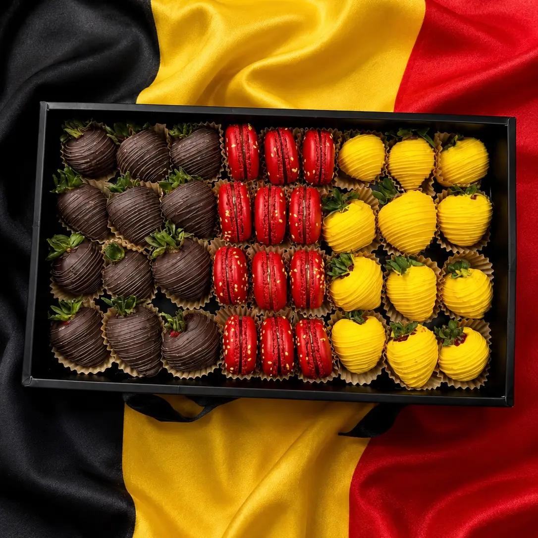 Belgium World Cup gift box with chocolate covered strawberries and macarons in black yellow and red flag colors Alt Text 1 Belgium World Cup gift box with chocolate covered strawberries and macarons in black, yellow, and red flag colors