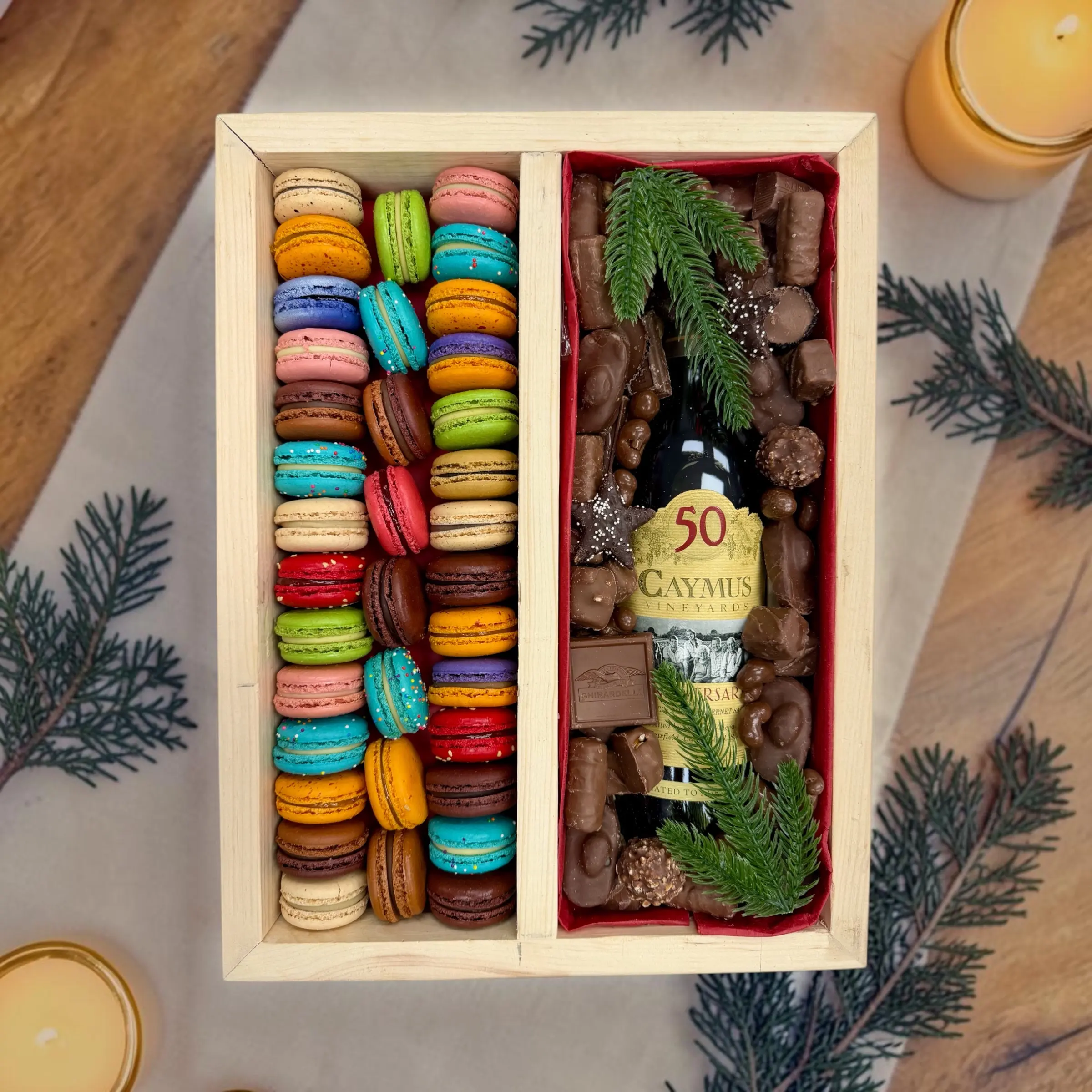 gourmet-macaron-chocolate-holiday-gift-box Luxury wooden gift box with colorful French macarons, assorted chocolates and a bottle compartment