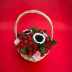 Birthday gift basket with a selection of fresh berries and coconut, making any occasion memorable
