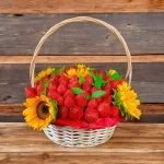 Bright and lively fruit basket with sunflowers and strawberries, ideal for gifting on birthdays, anniversaries, or just because