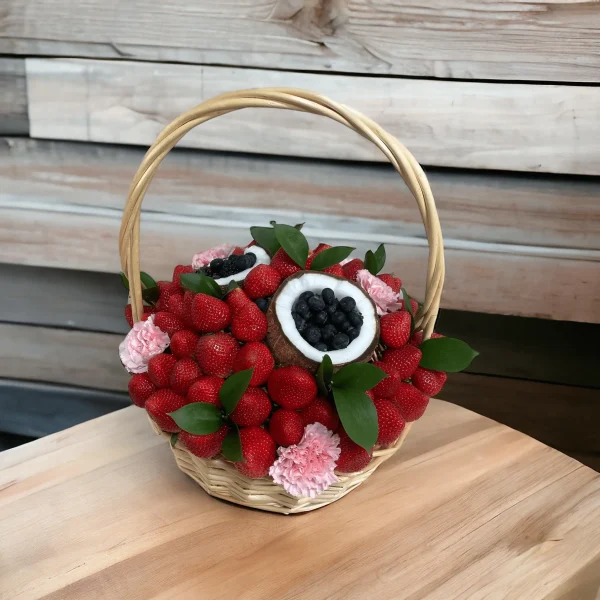 Unique fruit basket including fresh strawberries, blueberries, and coconut for a special celebration