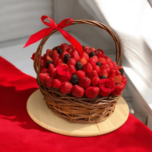 Stylish Strawberry Gift Basket featuring an assortment of fresh strawberries, blackberries, and gracefully arranged roses