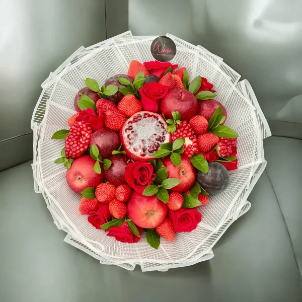 Luxurious fruit arrangement with fresh berries and elegant roses