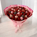 Luxurious chocolate covered strawberries bouquet with sweet treats