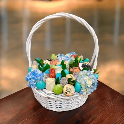 New parent gift basket with delicious sweets and beautiful flowers