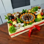 Circle Box Fresh Fruit Gift Box with a generous selection of fruits, chocolate-covered strawberries, and elegant macaroons