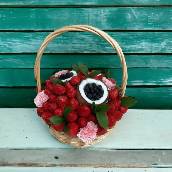 Special birthday basket featuring fresh strawberries, blueberries, and coconut, ideal for any celebration