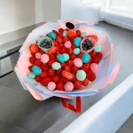 Chocolate strawberry bouquet featuring blue and pink chocolate