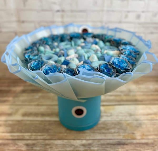 Bouquet with beautiful blue metallic roses