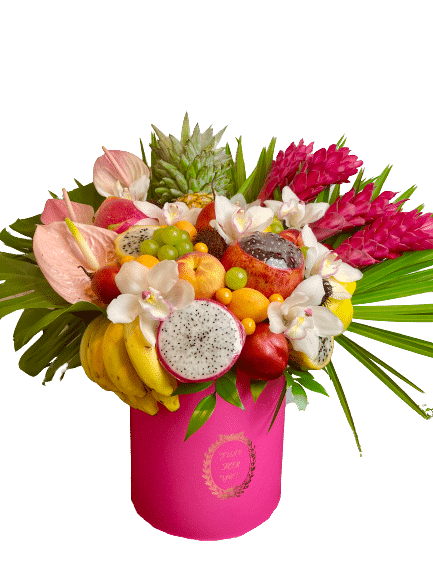 Tropical arrangement with exotic fruits and flowers