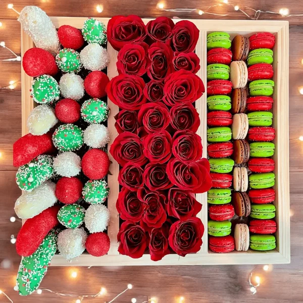 A perfect mix of sweets and elegance, our Sweets Box features chocolate-covered fruits, macarons, and roses for a special holiday treat.