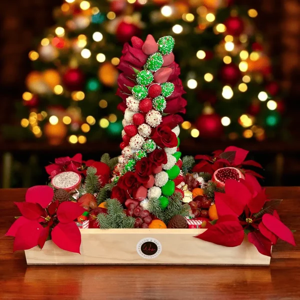 This holiday season, our Christmas Fruit Gift Box offers a grand display with fresh fruits, chocolates, and a towering strawberry arrangement.