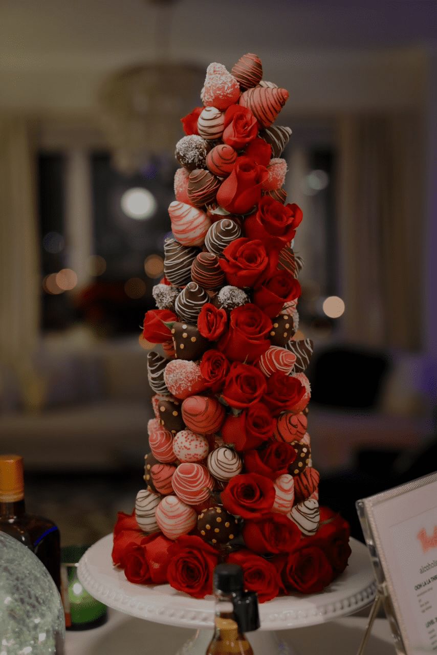 Strawberry Tower with fresh roses and chocolate covered strawberries
