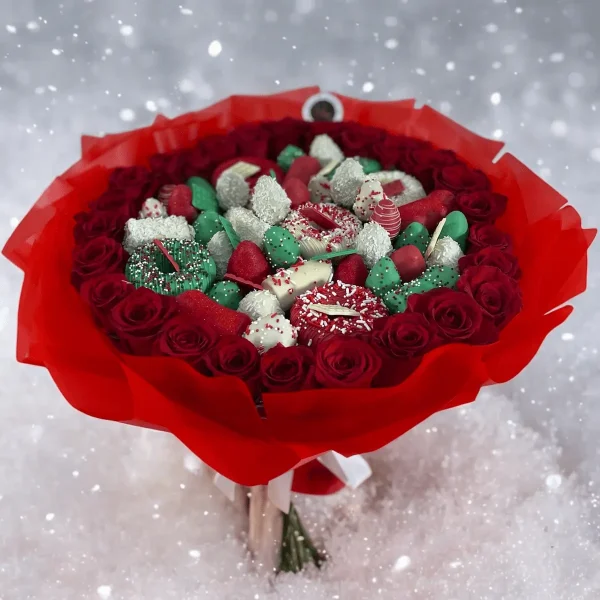 Treat someone special with this Holiday Gift Bouquet, featuring 2 dozen roses and chocolate-covered fruits for a sweet and elegant holiday surprise.