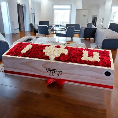 Beautifully arranged Roses Box with red and white roses in an "I love you" design