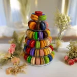 Beautifully arranged macaron tower with six layers of macarons.