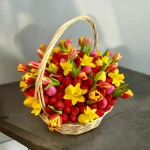 Seasonal Spring Basket with multi-colored tulips, fresh strawberries, and chocolate-covered strawberries