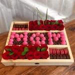 Mother's Day Gift Box featuring gourmet treats and beautiful roses