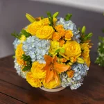 Vibrant Celebration Bouquet with a mix of blue and yellow blooms