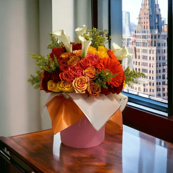 Picture of a lush NYC-themed floral arrangement, featuring a variety of seasonally available flowers in warm tones, ideal for brightening any space.