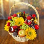 Fresh fruit basket for Rosh Hashanah, filled with apples, grapes, and pomegranates, symbolizing renewal and sweetness for the year ahead