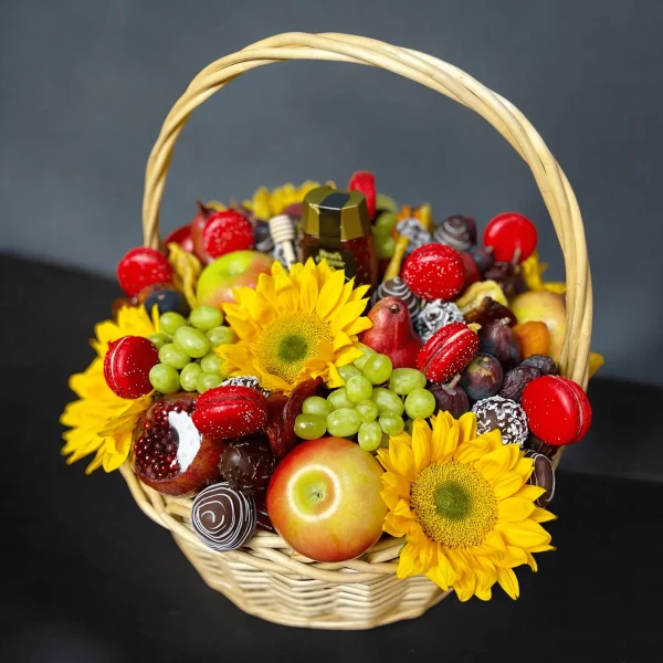 A vibrant Rosh Hashanah gift basket brimming with seasonal fruits, including apples, dates, figs, and pears, celebrating the arrival of a new year