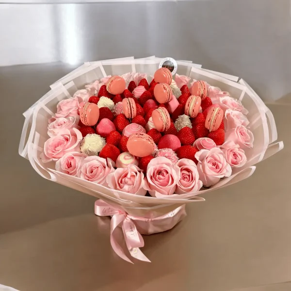 Pink Romance & Macarons fruit and floral bouquet with fresh strawberries and approximately two dozen roses