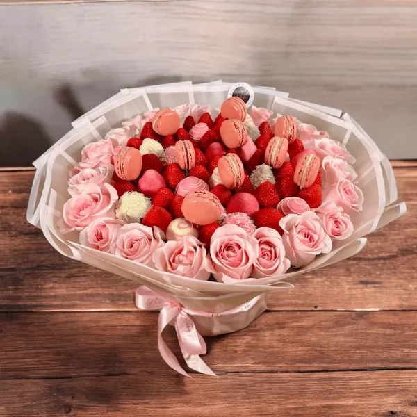 Pink Romance & Macarons bouquet with a blend of fresh strawberries and rose lychee macarons