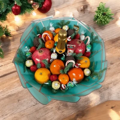 Celebrate the holidays with a Christmas Bouquet full of fresh seasonal fruits and decadent chocolates.