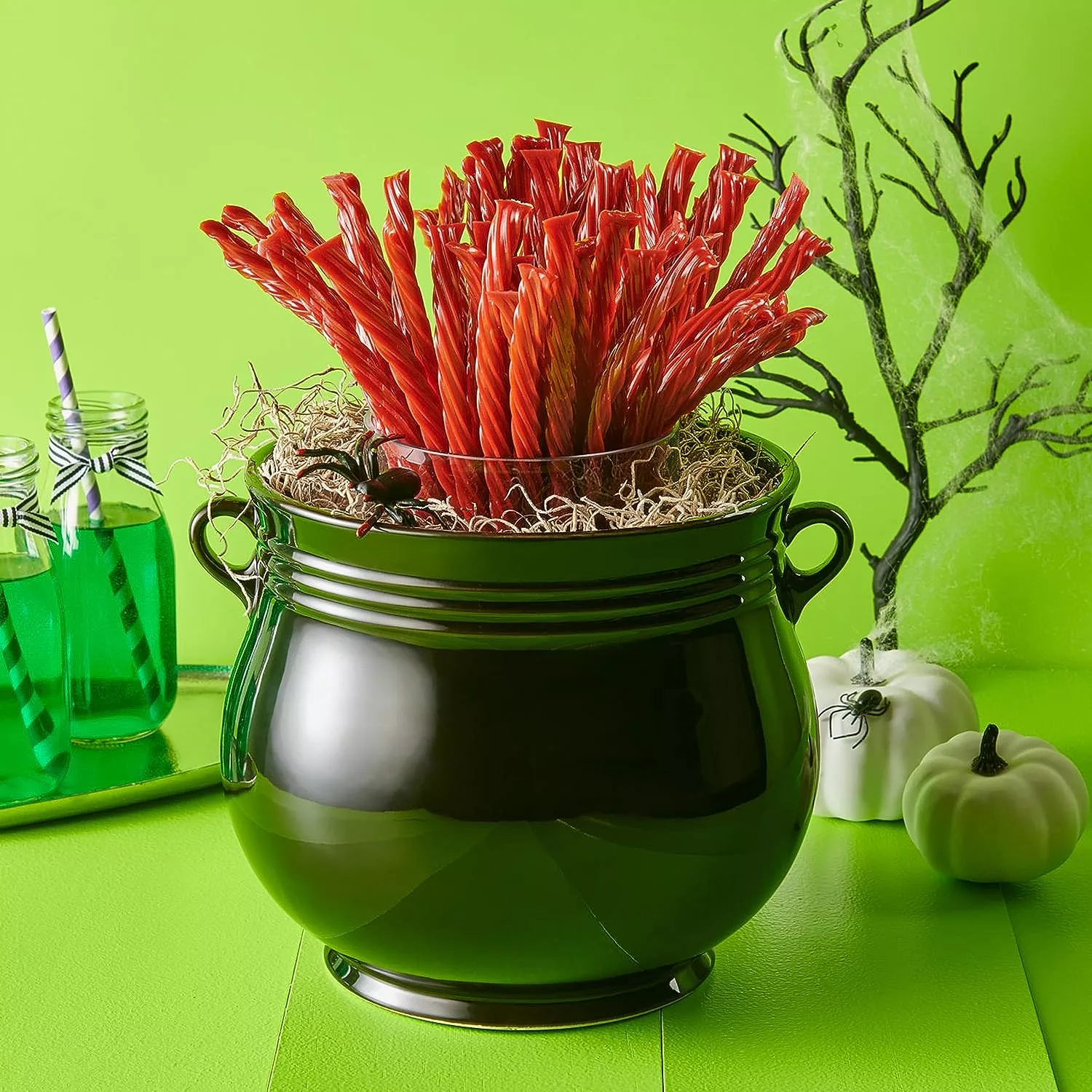 Close-up of Twizzlers licorice twists, showcasing their distinct helical shape and vibrant red color.