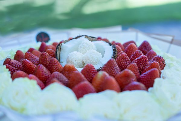 Lavish rose arrangement with tropical coconut flair in NYC