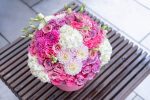 Detailed view of flower textures and colors in the arrangement.