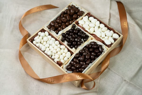 Elegant 10x10 Sweet and Nutty Gift Box filled with dark chocolate almonds, milk chocolate cashews, chocolate blueberries, and yogurt-covered nuts