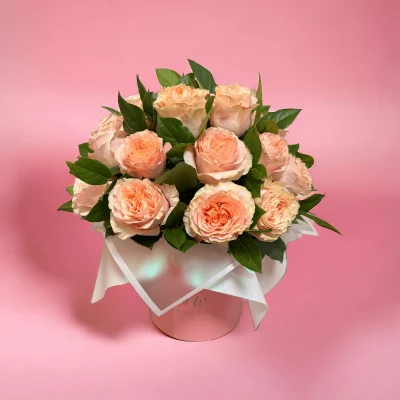 Elegant floral box filled with two dozen lush pink roses