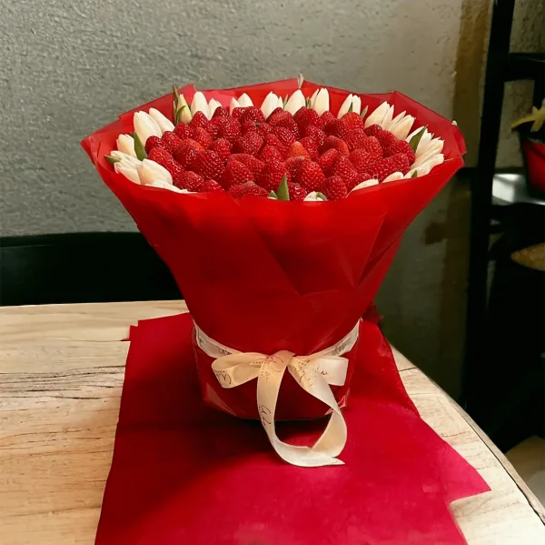 "Tulips with Strawberry" brings together the elegance of tulips in assorted colors with the natural sweetness of strawberries, easily available for local delivery.