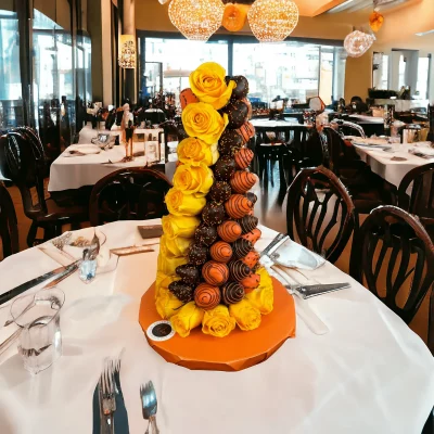 A striking Fall Themed Chocolate Covered Strawberries Tower, standing tall for a NYC event, ready for same day delivery.