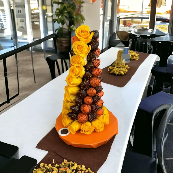 A grand 18-inch chocolate-covered strawberry tower, showcasing fall themes, perfect for making a statement at NYC events.