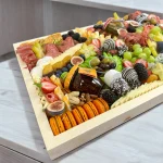 WOWBouquet Premium Charcuterie Box, a luxurious spread of meats, cheeses, and sweets for any occasion