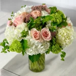 Luxurious hydrangea and rose bouquet with greenery