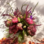 Large fall flower display with hydrangeas, peonies, and greenery