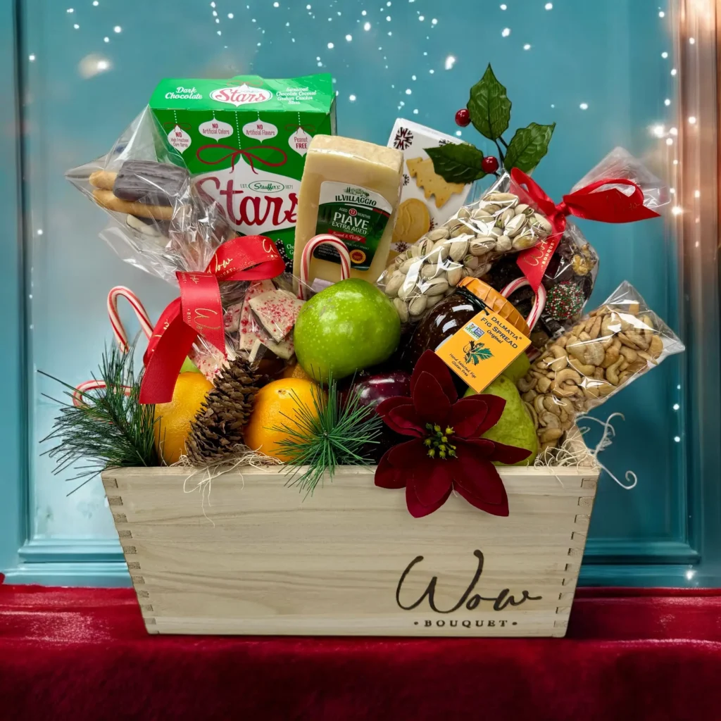 Full view of Holiday Cheer Christmas Gift Basket with holiday decorations.