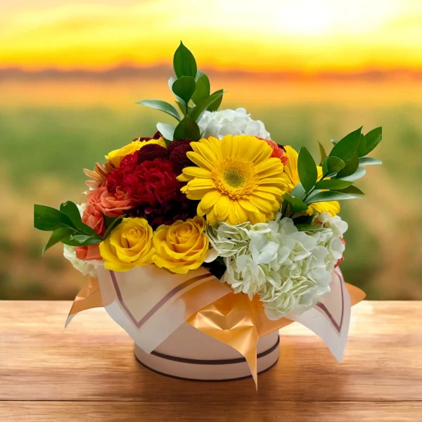 Side profile of a radiant anniversary bouquet in yellow, red, and orange hues.