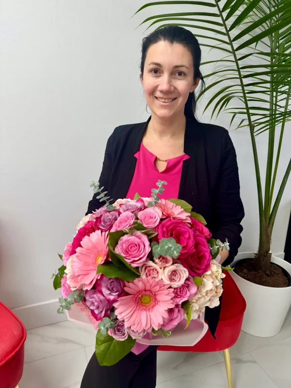 Birthday flower delivery with roses and colorful Gerbera daisies