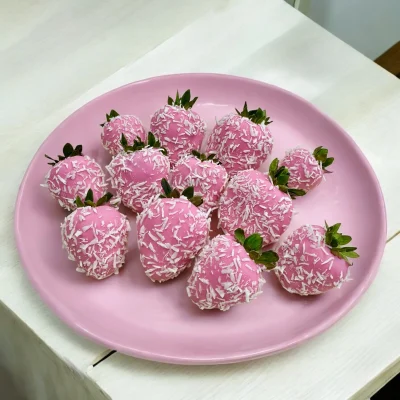 One dozen white Belgian chocolate-covered strawberries with coconut