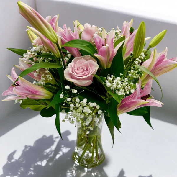 Freshly prepared pink lilies and pink roses in Bergen County