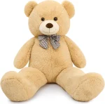 Close-up of the teddy bear’s face and plush fur