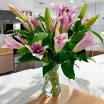 Soft pink lily blooms for same-day delivery