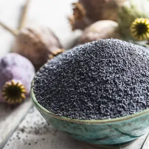 Tiny, black-blue poppy seeds highlighting their mild, nutty flavor.