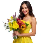 Cheerful summer bouquet in glass vase with yellow, red, and white blooms